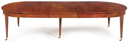 Mesa de comedor extensible Directorio en madera de caoba y palma de caoba.