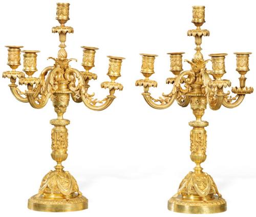 Pareja de candelabros de bronce dorado, Francia S. XIX.