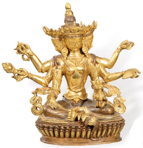"Trimurti" (Brahma, Vishnu y Shiva) en bronce dorado y patinado, Tibet S. XIX.