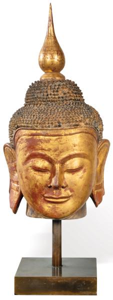 Cabeza de Buda en madera tallada y dorada posiblemente S. XIX.