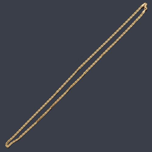 Cadena larga en oro amarillo de 18K.