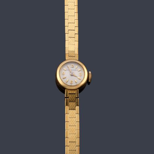 LONGINES de señora con caja y brazalete en oro amarillo de 18 K.