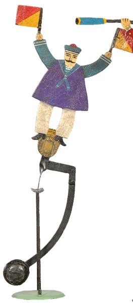 Tentetieso de hierro pintado "Hombre con Banderas"