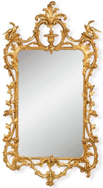 Marco de espejo rococó en madera tallada, calada y dorada.