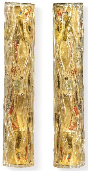 Pareja de apliques en vidrio de Murano color dorado.