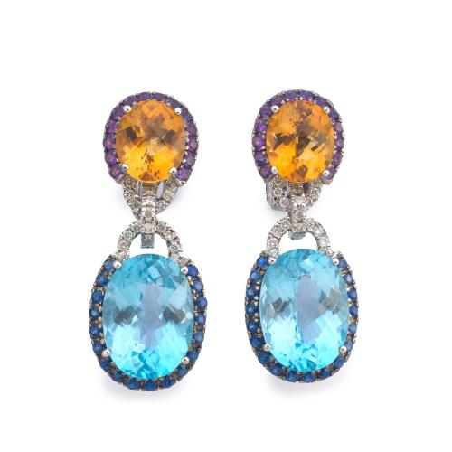 Pendientes largos con dos cuarzos citrinos y topacios azules facetados, con orla de amatistas y zafiros azules.