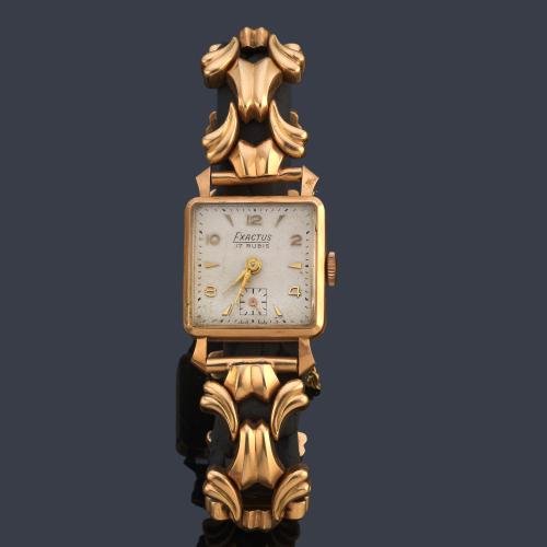 EXACTUS, de señora con caja y brazalete en oro amarillo de 18 K, años 40.