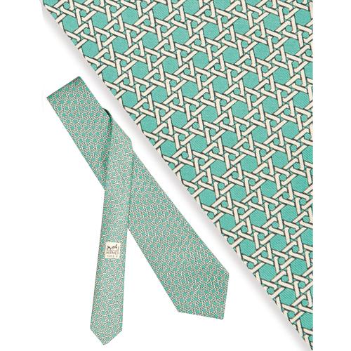 Corbata Hermés, con motivos de greca sobre fondo verde