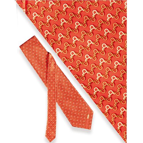 Corbata Zilli con diseño de cadenetas sobre fondo naranja