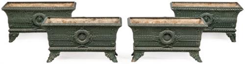 Cuatro jardineras de hierro colado ff. S. XIX