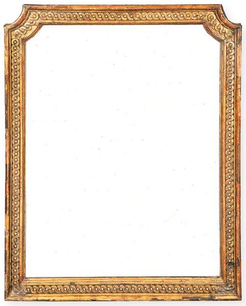 Marco de espejo Carlos IV en madera tallada y dorada con decoración de lazos.