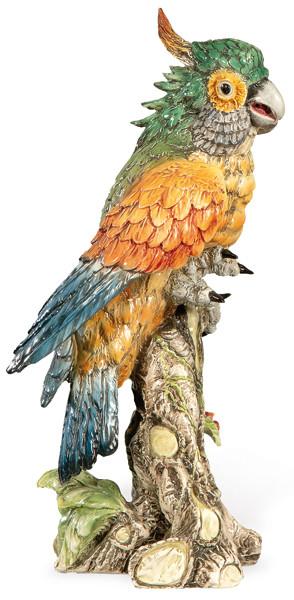 Figura de guacamallo sobre el tronco de un roble en loza modelada de Capodimonte, con marca en la base.