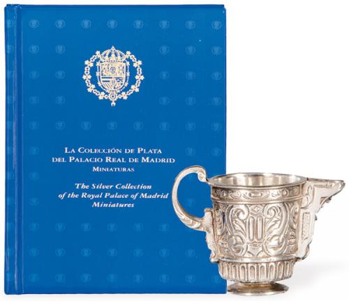 Miniatura Jarra de pico con libro