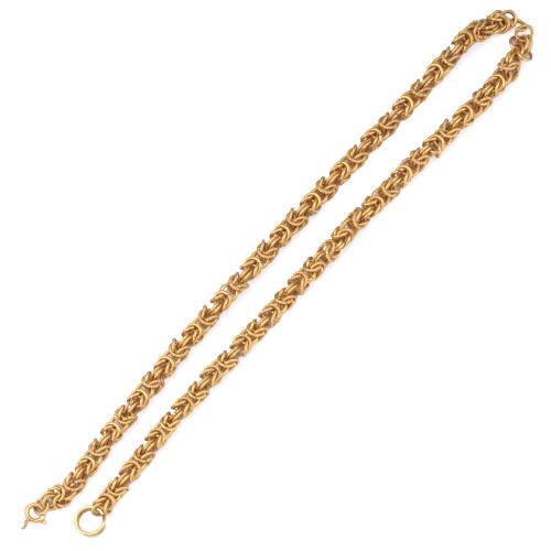 Collar con motivos circulares en montura de oro amarillo de 18K.