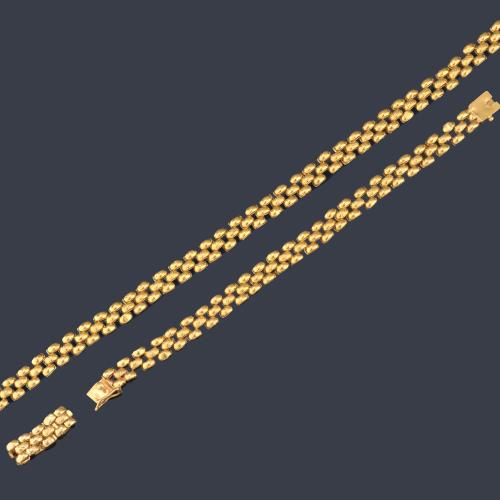 Conjunto de collar, pulsera y anillo articulado en oro amarillo de 22K.