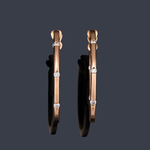 Criollas con brillantes salpicados en montura de oro rosa de 18K.