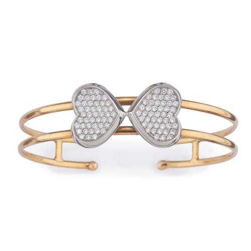  Pulsera rígida con dos corazones en pavé de brillantes de aprox.  1,00 ct en total.