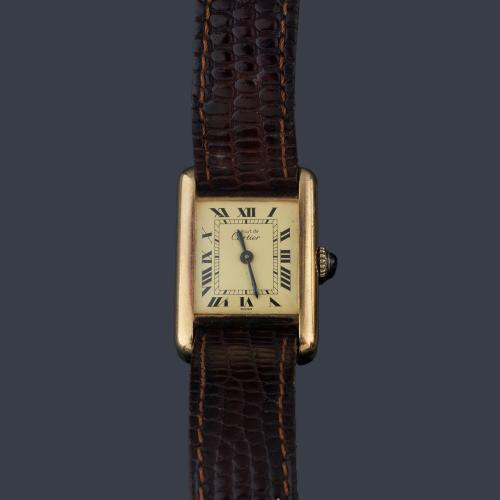 CARTIER Tank de señora con caja en plata chapada en oro.