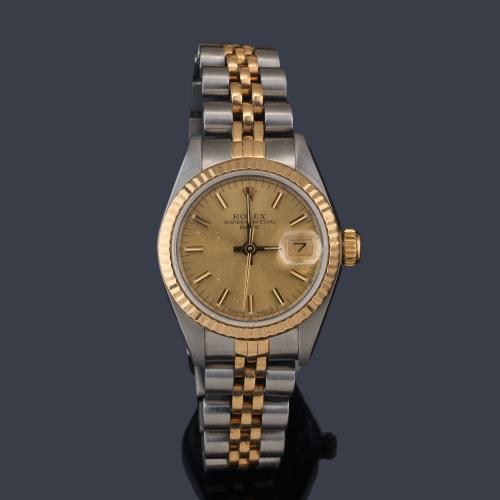 ROLEX Oyster Perpetual  Date Lady  ref. 69173 con caja y brazalete en acero y oro. Con estuche.