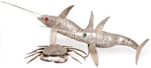 Pareja de peces espada articulados, de plata española punzonada 1ª Ley.