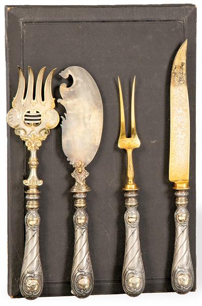 Juego de cuatro cubiertos de servir de plata alemana punzonada Ley 800 pp. S. XX.