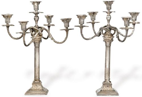 Pareja de candelabros converitbles en candelero de metal plateado con marcas de Hernandez pp. S. XX.
