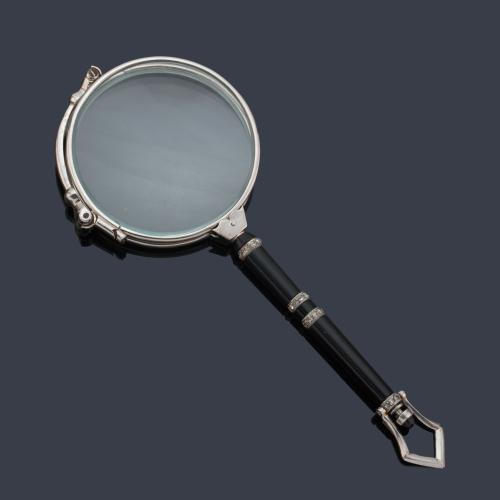 Impertinentes de ópera franceses época 'Art Decó' con mango realizado en ónix y decorado con diamantes talla rosa. Años '20.