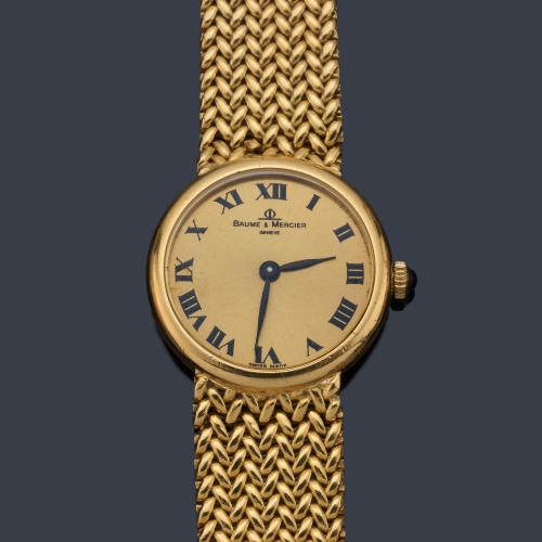 BAUME MERCIER de señora con caja y brazalete en oro amarillo de 18 K.