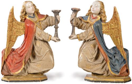 Pareja de ángeles torcheros de madera tallada, policromada y dorada, España S. XX.