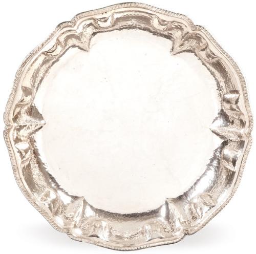 Gran fuente honda circular de borde ondulado, de plata española punzonada 1ª Ley.