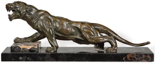 Leona de bronce Deco
