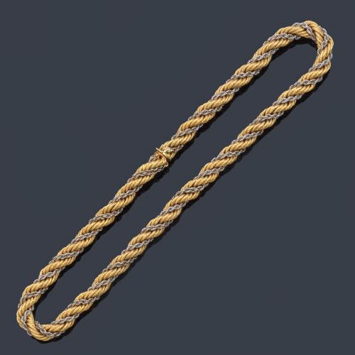 Cadena con diseño de cordón en oro amarillo y blanco de 18K.