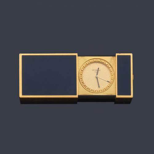 Reloj despertador DUPONT de viaje con caja dorada y esmalte azul.