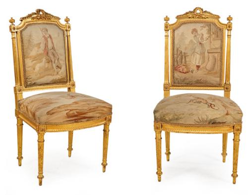 Pareja de sillas Napoleón III, estilo Luis XVI en madera tallada y dorada, con tapicería de Aubusson.