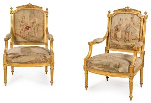 Pareja de butacas Napoleón III, estilo Luis XVI en madera tallada y dorada, con tapicería de Aubusson.