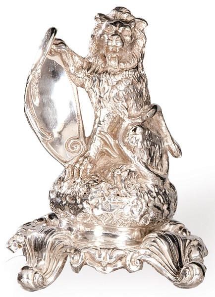 Palillero de plata en forma de león con escudo S. XIX.