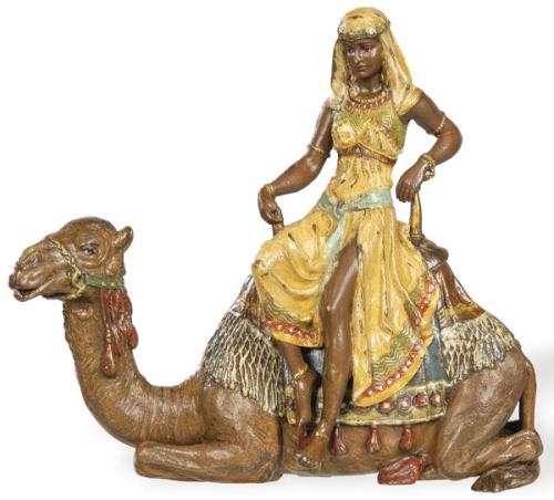 "Mujer y Camello" escultura orientalista de bronce policromado, Viena h. 1900.