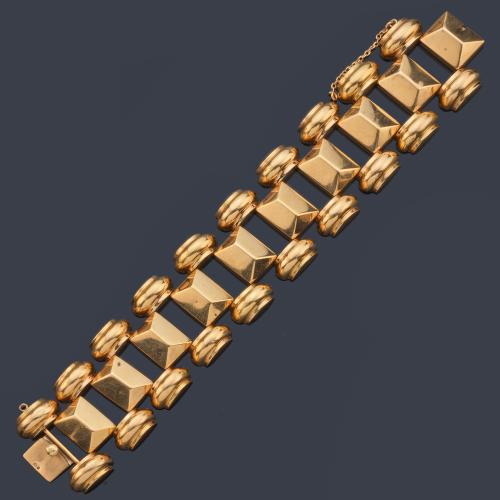  Pulsera retro años '40 con diseño característico en oro amarillo de 18K.