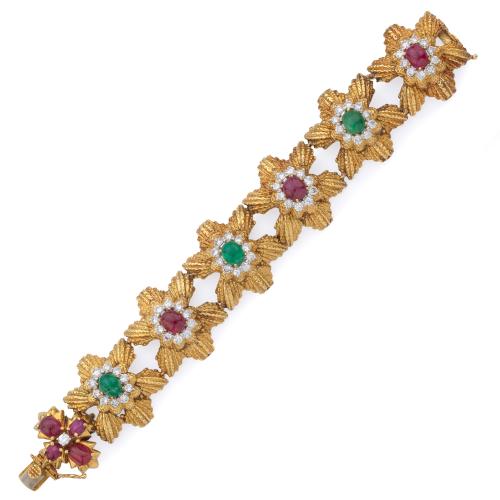  Pulsera con rubíes y esmeraldas talla cabujón orlados de brillantes sobre montura de oro amarillo de 18K. Años '70 - 80.