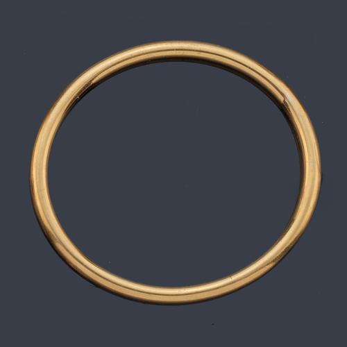 Pulsera rígida en oro amarillo de 18K.