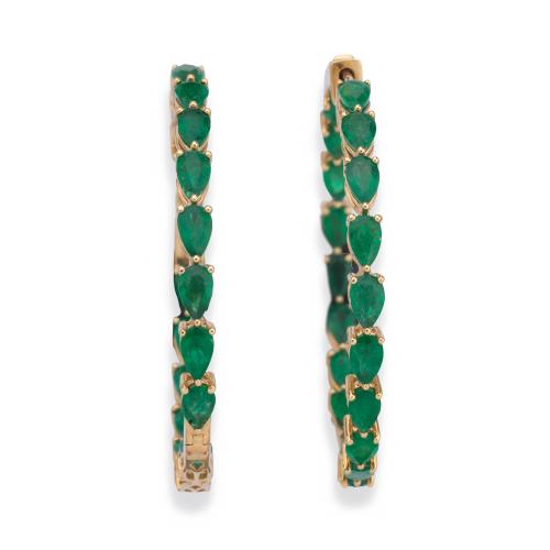  Criollas XL con banda de esmeraldas talla oval de aprox. 7,35 ct en total.