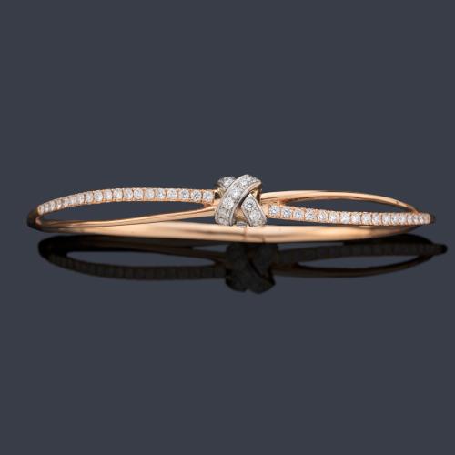 Pulsera con motivo de nudo con brillantes de aprox. 1,00 ct en total en montura de oro rosa de 18K.
