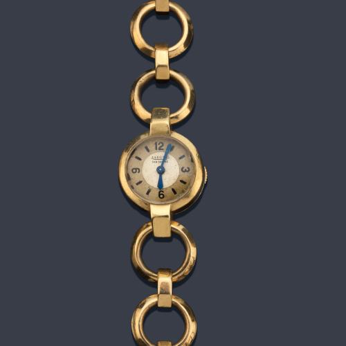 JAEGER de señora con caja y brazalete en oro amarillo de 18 K.