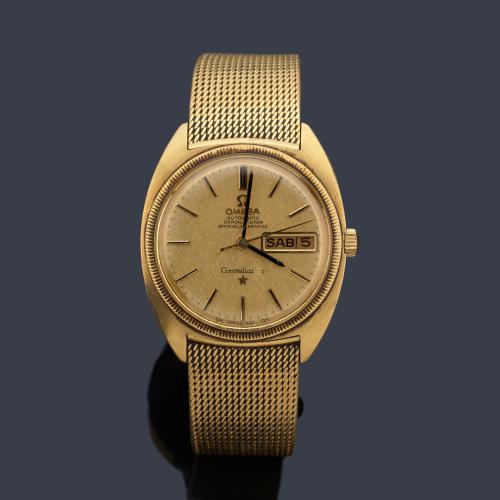  OMEGA Constellation de caballero con caja y brazalete en oro amarillo de 18 K.