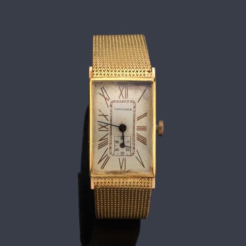  LONGINES de caballero con caja y brazalete en oro amarillo de 18 K.