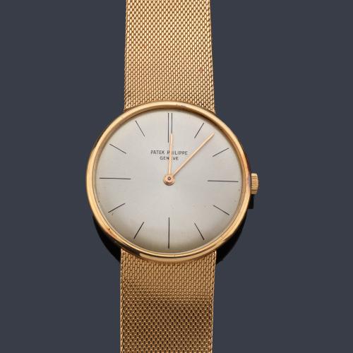 PATEK PHILIPPE ref. 2592-1 de caballero con caja y brazalete en oro amarillo de 18 K.