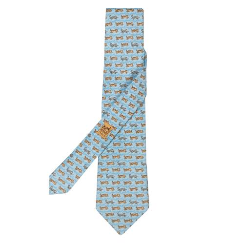 Corbata Hermés motivos de tigres y monos en color azul.