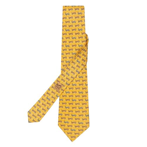Corbata Hermés motivos de tigres y monos en color amarillo.