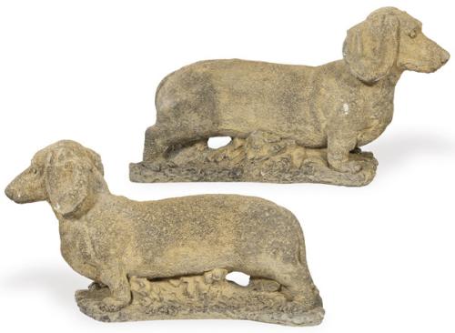 Pareja de perros salchicha de arenisca para jardín.