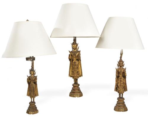  Tres lámparas de mesa realizadas con esculturas de de Buda en bronce dorado, Tailandia S. XIX.
